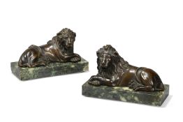 A PAIR OF LATE REGENCY BRONZE FIGURES OF LIONS, POSSIBLY ENGLISH, CIRCA 1820-1840