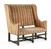 A GEORGE I GREEN PAINTED WING BACK SOFA, EARLY 18TH CENTURY