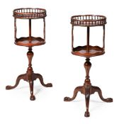 AN UNUSUAL PAIR OF CARVED MAHOGANY TWO TIER ROTATING ETAGERES, IN GEORGE III STYLE, 20TH CENTURY