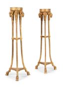 A PAIR OF CARVED GILTWOOD TORCHERES, IN THE MANNER OF ROBERT ADAM, IN GEORGE III STYLE, 20TH CENTURY