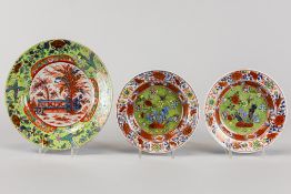 pair of small and one bigger 18th Cent. Chinese "clobberware" plate in porcelain with a typical poly