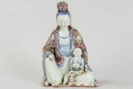 Chinese "Quan Yin with child" sculpture in marked porcelain