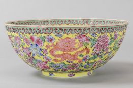 Chinese Republic period bowl in marked eggshell porcelain with a 'Famille Rose' decor with dragons a
