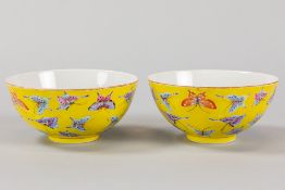 pair of 'antique' Chinese bowls in marked porcelain with a polychrome decor with butterflies