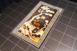 'antique' Chinese Qing period rug in wool with a garden decor with bird and deer