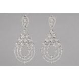 pair of earrings with a superb design in white gold (18 carat) with at least 3,65 carat of very high