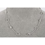 necklace in white gold (18 carat) with open and closed ellipses