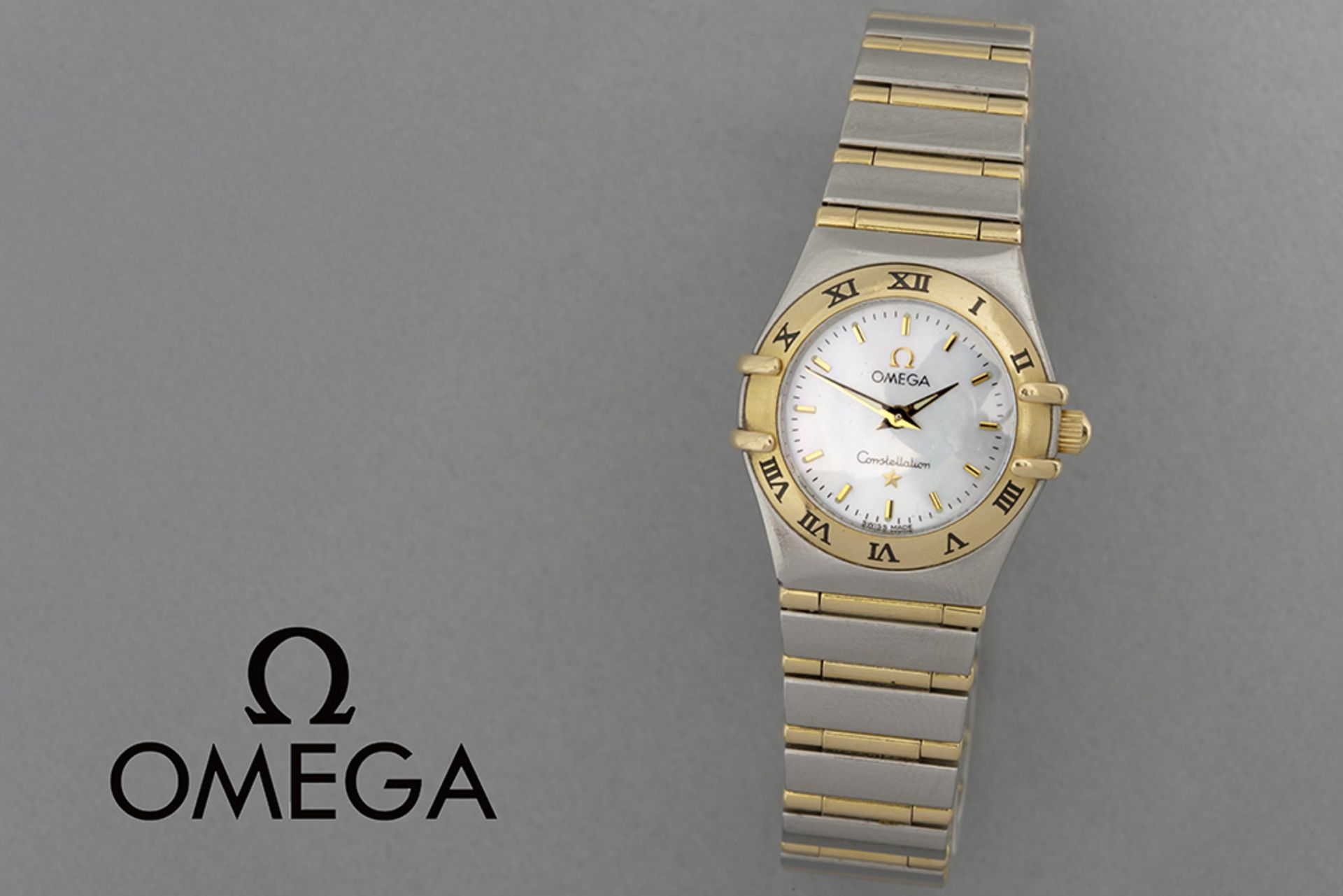 completely original Omega marked quartz "Constellation" ladies' wristwatch in steel and gold with a 