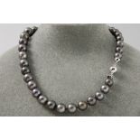 nice necklace with real Tahiti pearls (9,7 - 14,4 mm) and with a lock in white gold (18 carat)