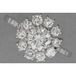 ring in platinum with a 1,01 carat high quality brilliant cut diamond, surrounded by ca 0,90 carat o
