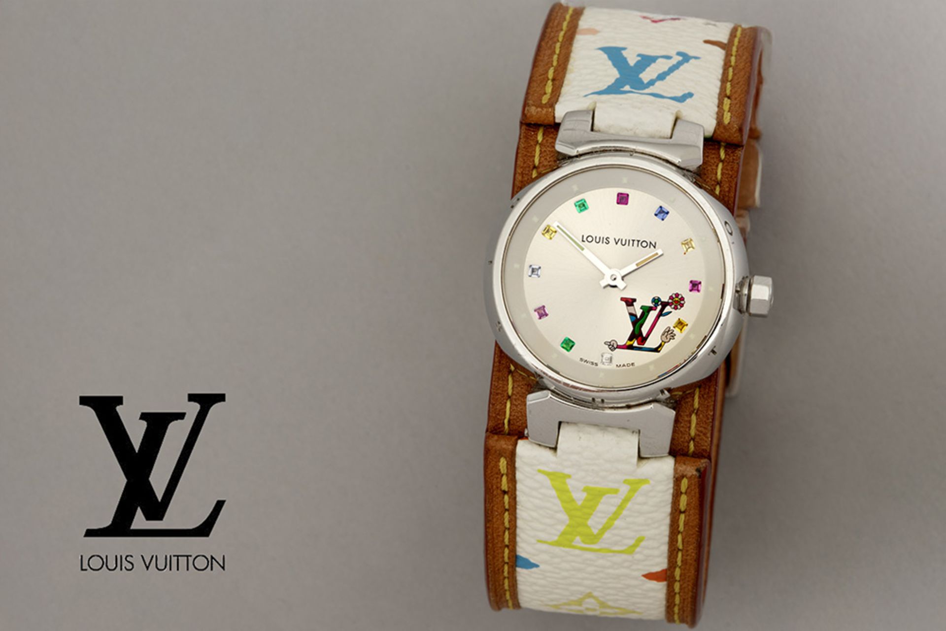 completely original Louis Vuitton quartz marked "Tambour Love Monogram" ladies' wristwatch in steel