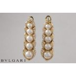 superb Bulgari signed pair of earrings in yellow gold (18 carat) with pearls, selected for their whi