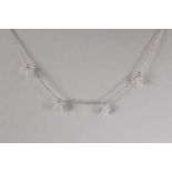Rino signed necklace in white gold (18 carat) with four pendants that spell 'Love' with ca 0,24 cara