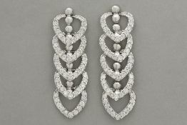 pair of earrings each with five heart shapes in white gold (18 carat) with ca 2,50 carat of high qua
