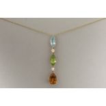 pendant in pink gold (18 carat) with a topaz, peridot and a citrine and some small high quality bril