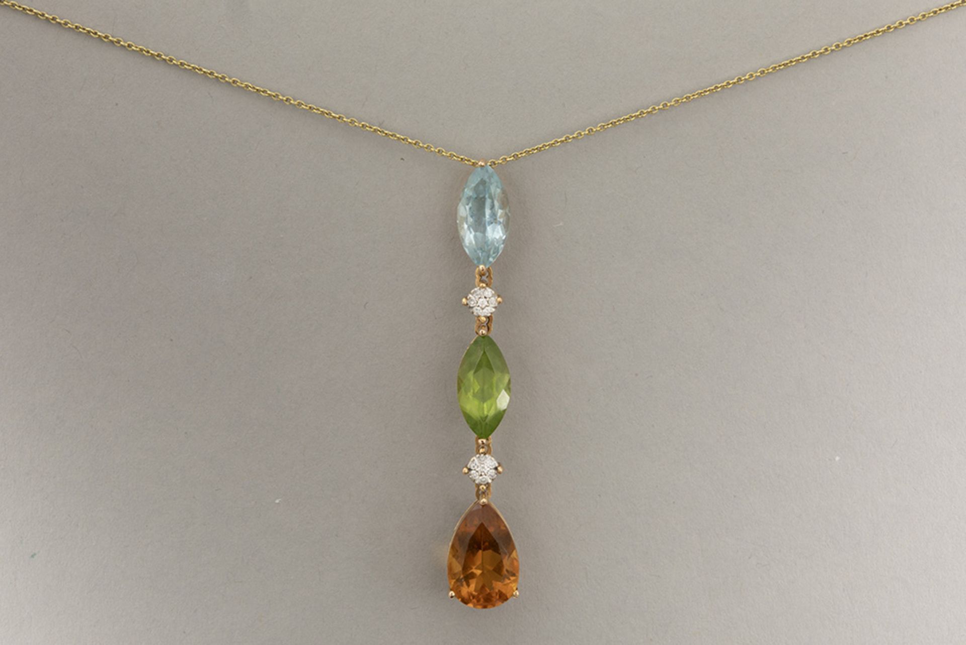 pendant in pink gold (18 carat) with a topaz, peridot and a citrine and some small high quality bril
