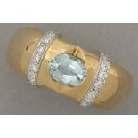 ring in yellow gold (18 carat) with a light blue topaz and at least 0,20 carat of quality brilliant 