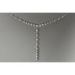 elegant and fashionable necklace in white gold (18 carat) with ca 2,30 carat of high quality brillia