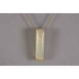 quite special pendant in pink gold (18 carat) with a 12,56 carat opal with a special cabochon shape 