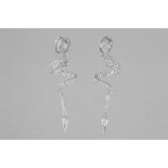 matching pair of "Clem Vercammen Collection" earrings in white gold (18 carat) with a snake motif wi