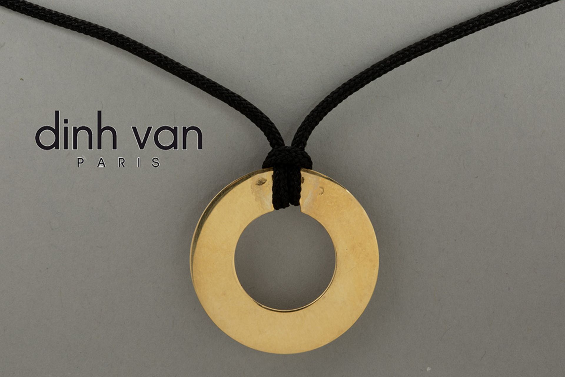 typical Dinh Van pendant in yellow gold (18 carat) - marked and signed