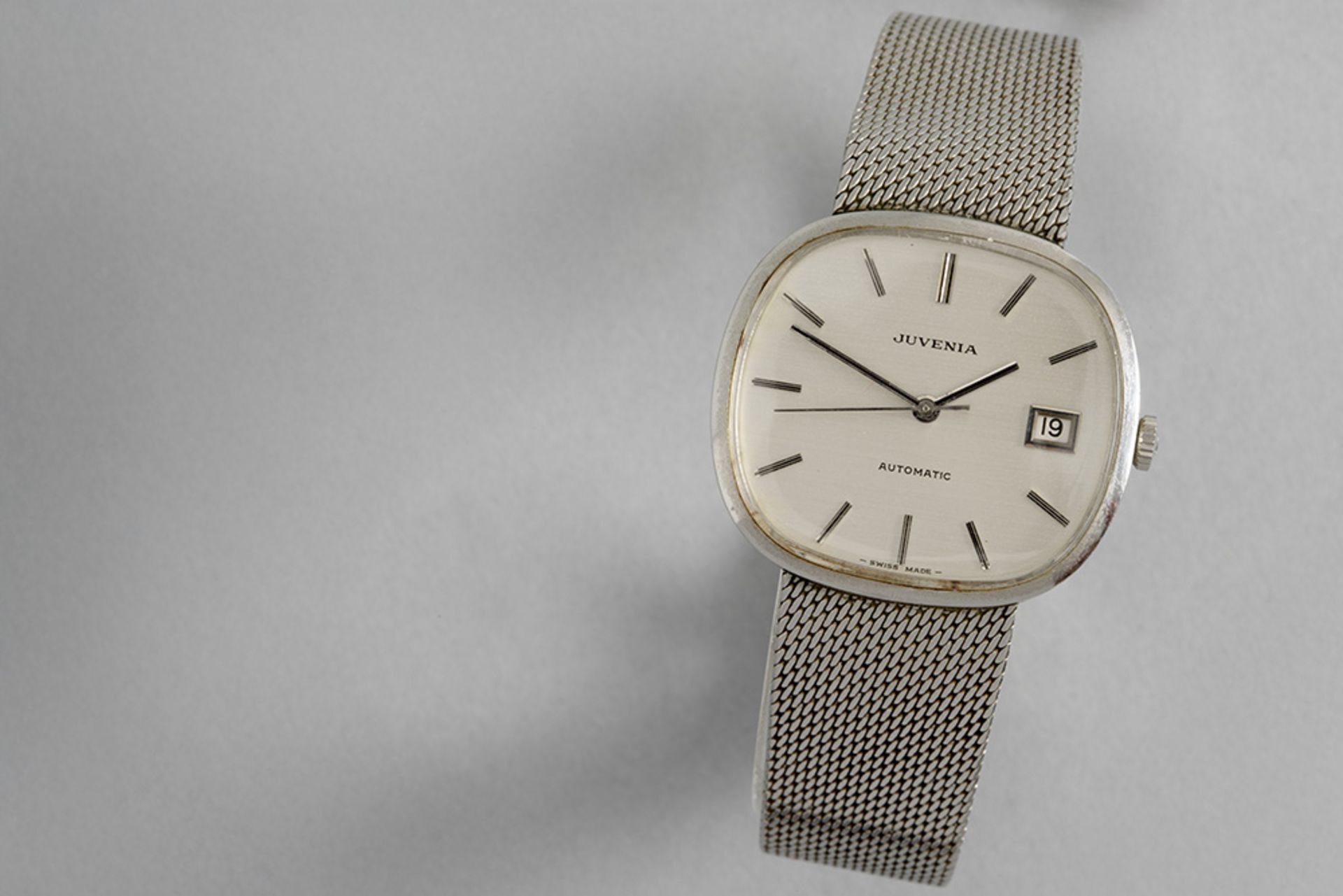 completely original Juvenia marked automatic wristwatch in steel - with its box