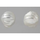 matching pair of earrings in white gold (18 carat), each with a quite big baroque South Sea pearl