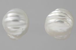 matching pair of earrings in white gold (18 carat), each with a quite big baroque South Sea pearl