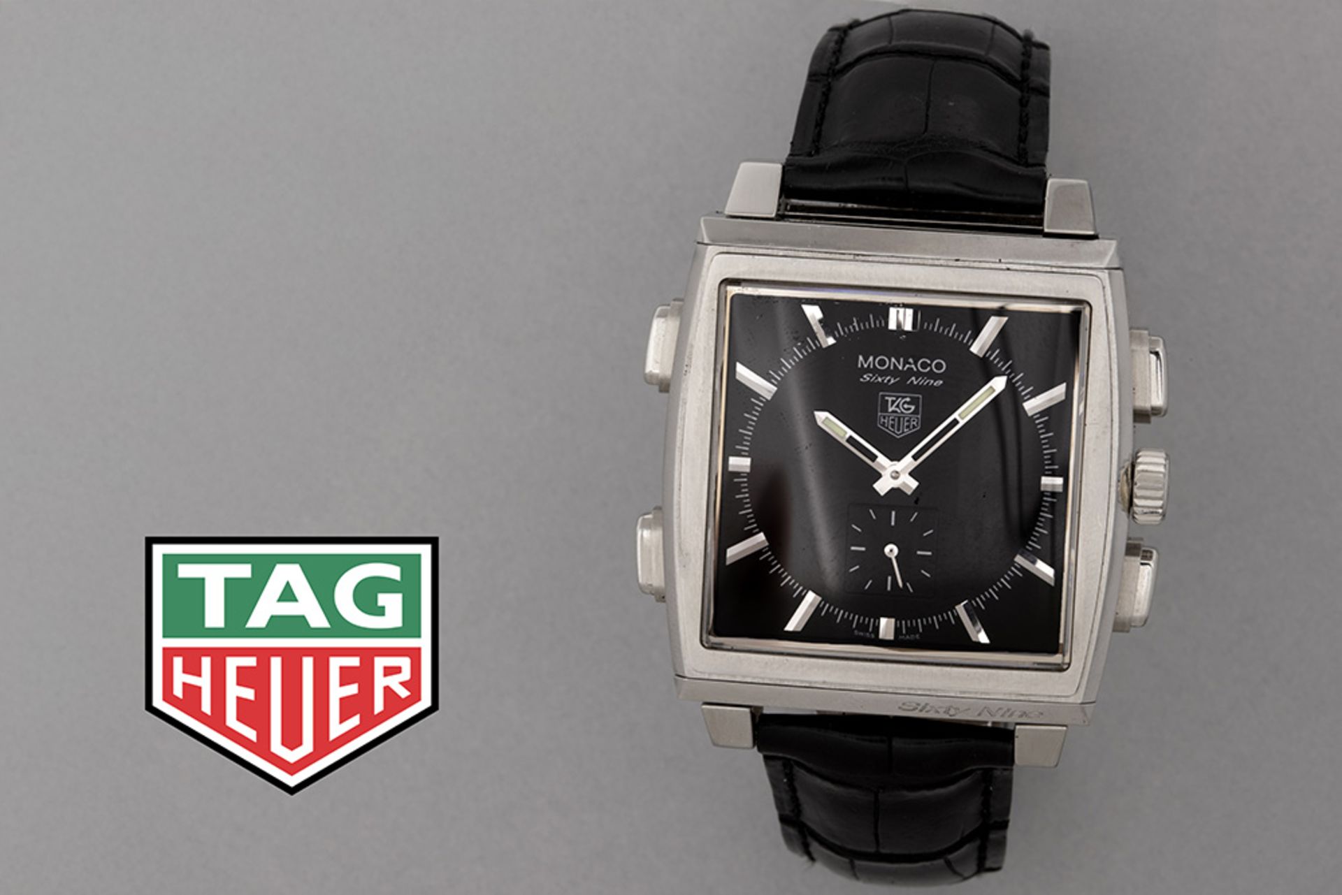 rare Tag Heuer marked Reverso "Monaco Sixty Nine" wristwatch with a digital watch on one side and a 