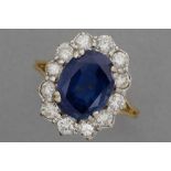 vintage ring with a classic cluster model in yellow and white gold (18 carat) with a sapphire, weigh