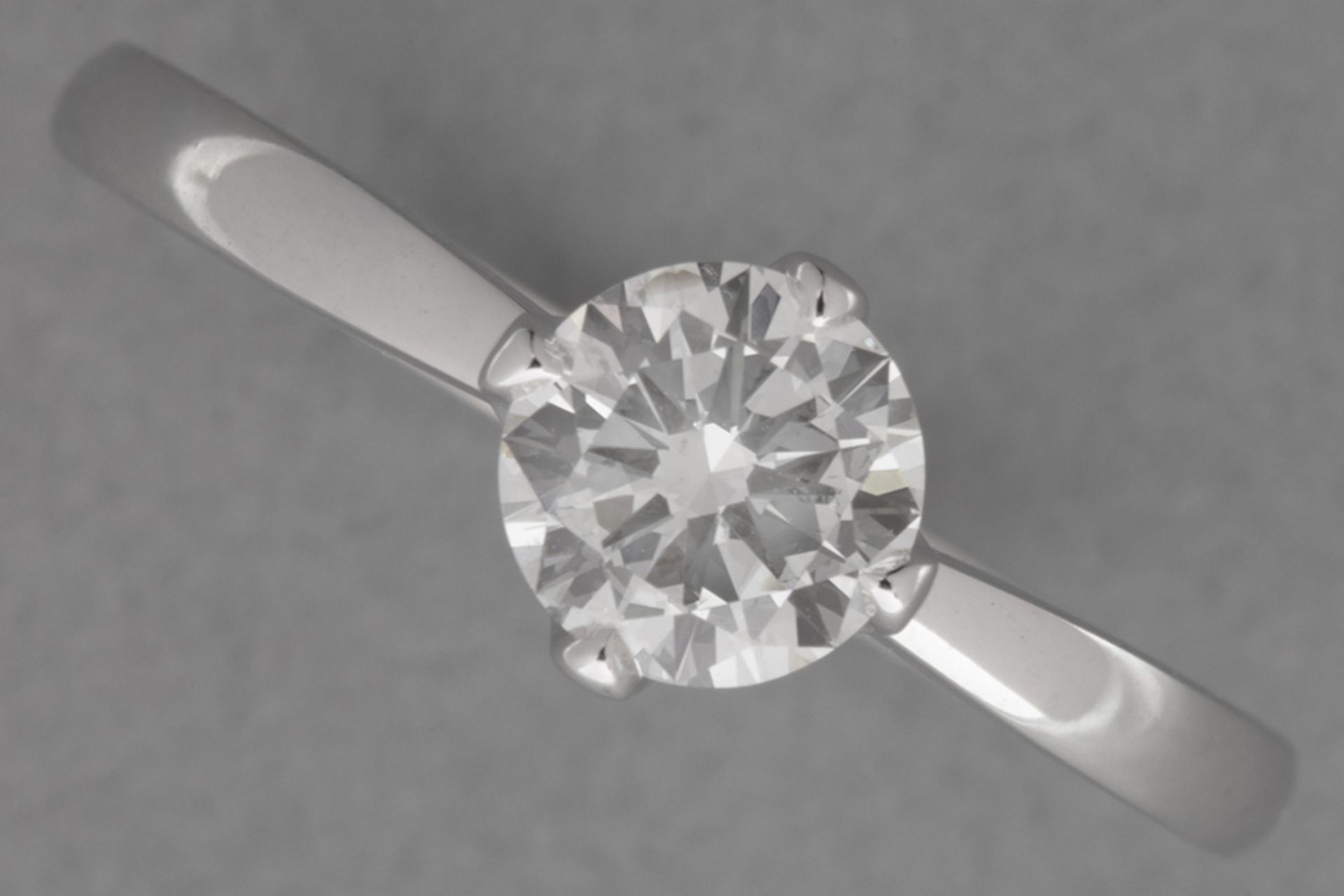 a 0,72 carat high quality brilliant cut diamond set in a ring in white gold (18 carat)