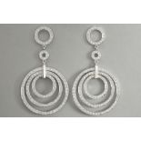 pair of fashionable earrings in white gold (18 carat) with ca 2,80 carat of very high quality brilli