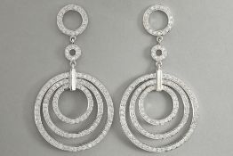 pair of fashionable earrings in white gold (18 carat) with ca 2,80 carat of very high quality brilli
