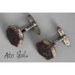 pair of Chale cuff-links in silver each with a plaque in (rough) ruby - with their Chale marked box