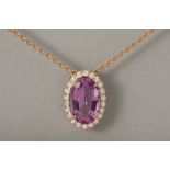 delicate 18-karat rose gold necklace with an oval pendant featuring a very important 3.08 carat "Imp