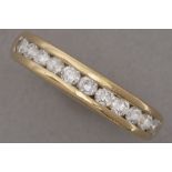 (wedding) ring in yellow gold (18 carat) with ca 0,40 carat of quality brilliant cut diamonds