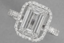 a at least 5 carat very high quality brilliant cut CVD diamond set in a ring in white gold (18 carat