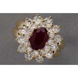 classic cluster ring in yellow gold (18 carat) with an oval ca 1,50 carat ruby surrounded by ca 1,50