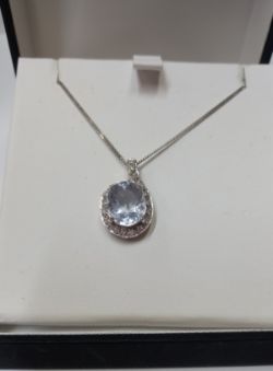 LARGE OVAL AQUAMARINE & DIAMOND PENDANT 9CT WHITE GOLD & 16