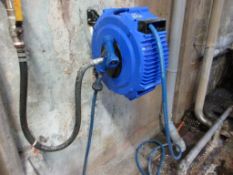 Reelcare wall mounted retractable hose