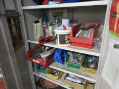Two various metal cupboards with contents including chain, air line hose, 110v extension lead, etc.