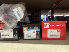 Contents of rack to include various quantities of YTT suspension mounts, engine mounting, engine