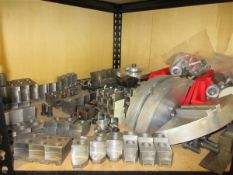 Contents of shelf to include various soft jaws and engineering tooling