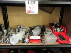 Contents of shelf to include various collets, setting rings & soft jaws