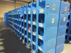 Large quantity of assorted clothing to part row U (including corrugated pigeon holes)