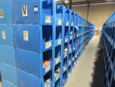 Large quantity of assorted clothing to part row V (including corrugated pigeon holes)