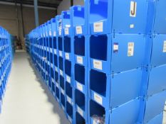 Large quantity of assorted clothing to part row J (including corrugated pigeon holes)