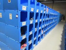 Large quantity of assorted clothing to part row J (including corrugated pigeon holes)