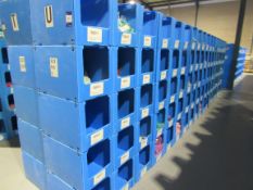 Large quantity of assorted clothing to part row U (including corrugated pigeon holes)