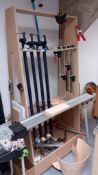 Small quantity of sash clamps to rack